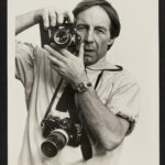 Peter Bush with cameras, 1970s